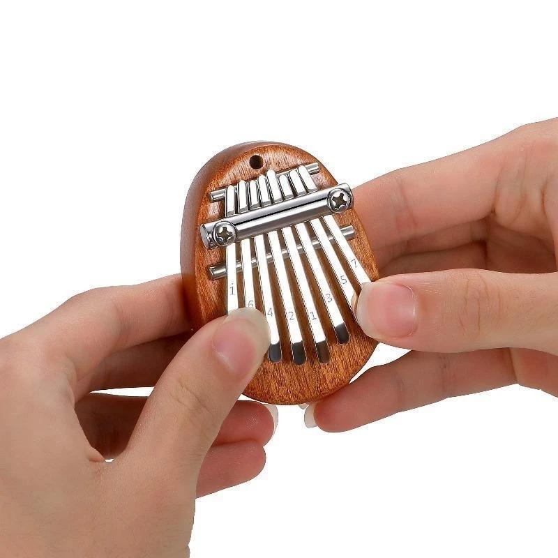 8 taustiņu kalimbas mūzikas instruments